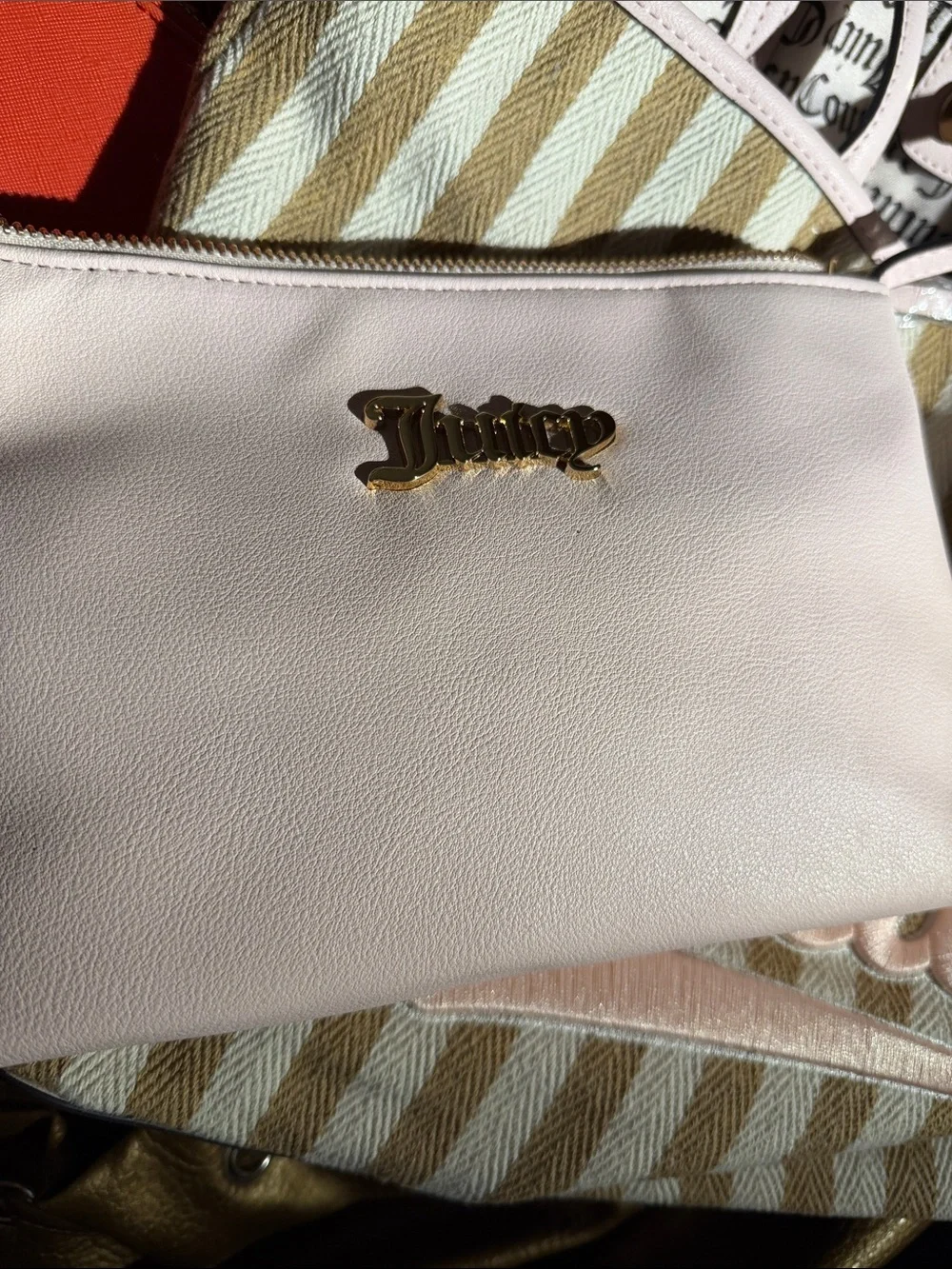 Light Pink Women's Leather Wristlet Pouch with Gold Logo Keychain and purse